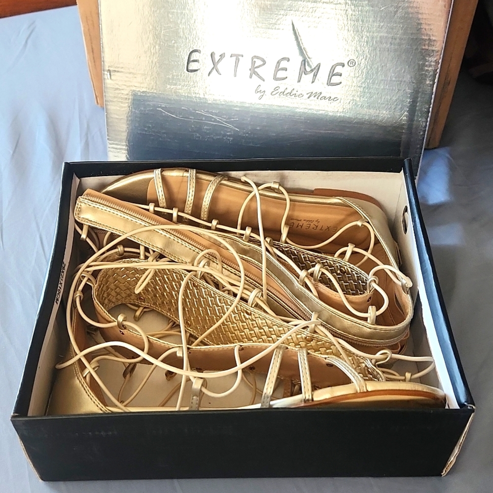 Gold Greek goddess shoes.